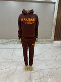 Dark brown Kalzani jogger sweatsuit.