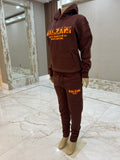 Dark brown Kalzani jogger sweatsuit.